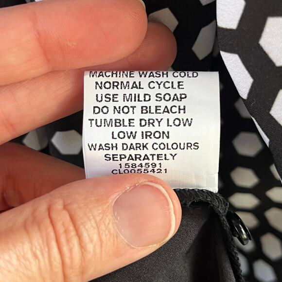 Elegant Black and White Polka Dot Dress with Red Accents - Picture 9 of 9